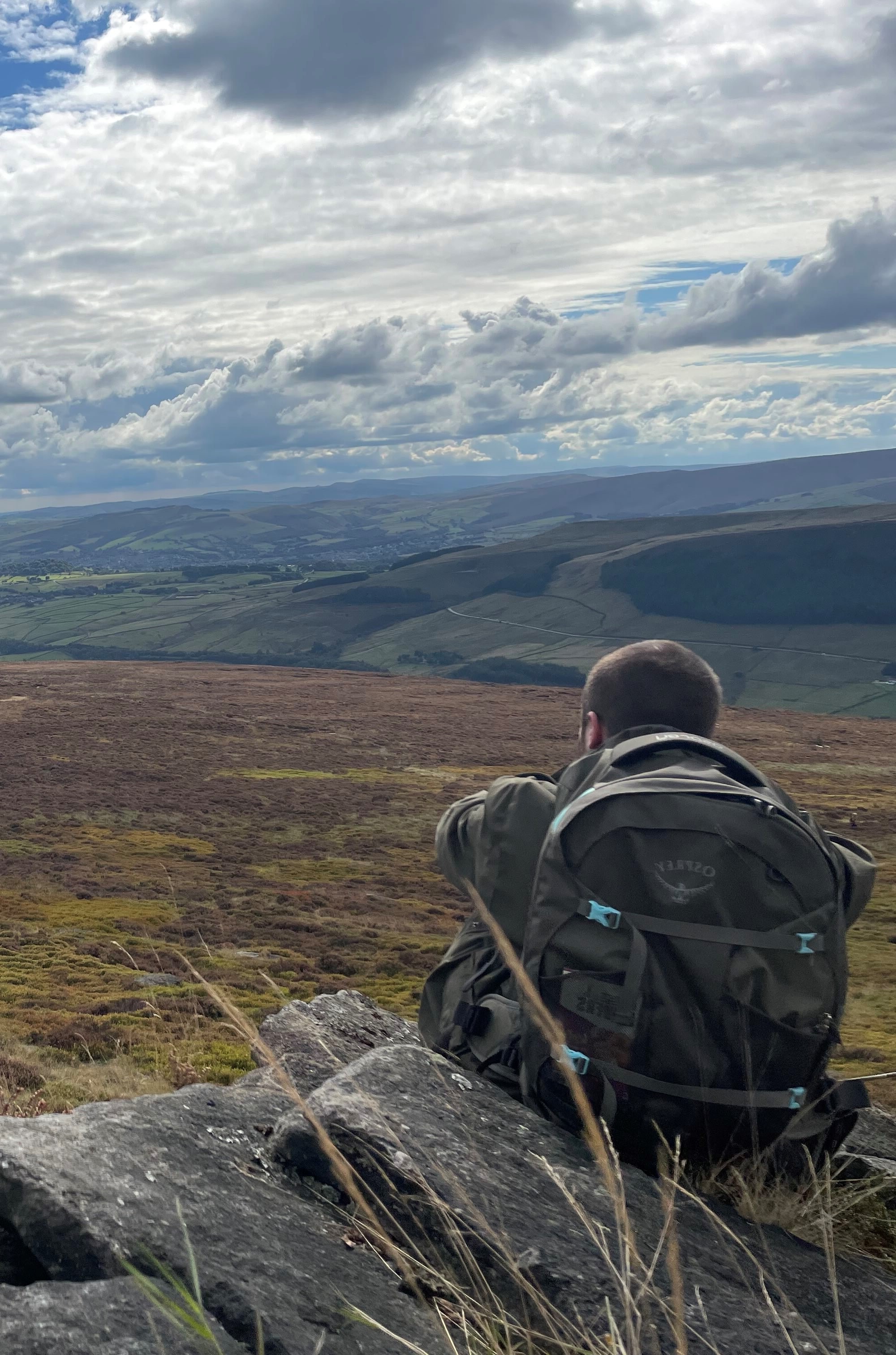 Ethan during a hike overlooking the Peak District and Oldham in the distance